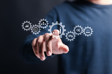 Business analytics and big data analysis concept. Process automation management with KPI financial charts and graph, marketing dashboard. Businessman touching analysis icon on virtual screen.