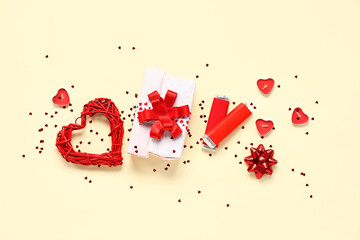 Composition with gift box, chocolate and decor for Valentine's Day celebration on color background