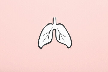 Drawn paper lungs on beige background