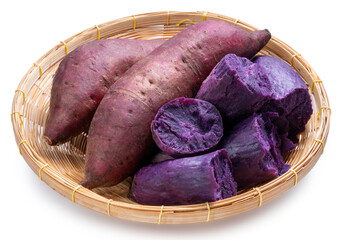 Purple potato in basket isolated on white background, Japanese Purple Sweet Potato on White...