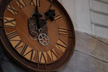 Steampunk industrial decor: retro-futuristic time machine clock, with roman numerals, gears and...