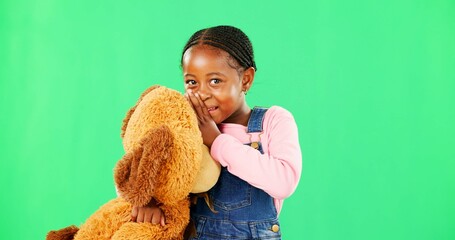 Child, teddy bear and smile by green screen in portrait for whisper, gossip or story with mockup...