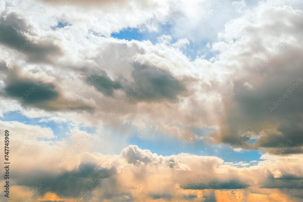 Wall mural Sun rays breaking through the clouds