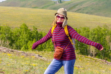 beautiful mature women travels through the mountains of the Southern Urals