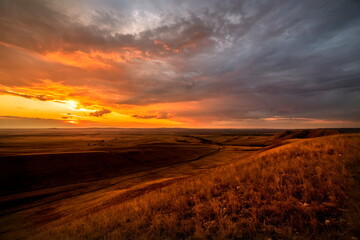 Magnificent landscape of the Karamuruntau ridge in the rays of the setting sun