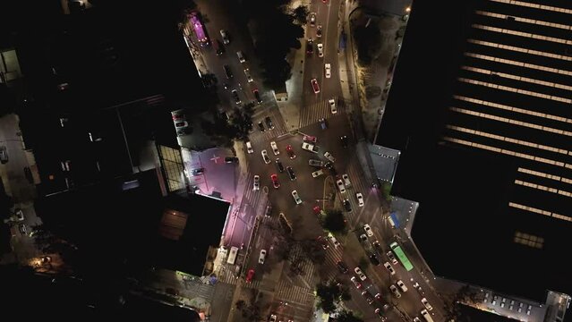 Aerial hyperlapse of a chaotic illuminated intersection in CDMX