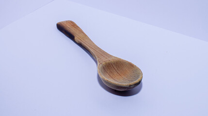wooden spoons on a white