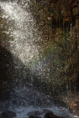 Rainbow forms at the base of Blackledge Falls in Connecticut.