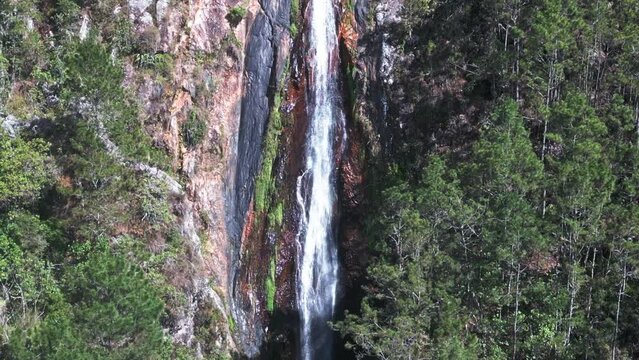 Salto de Aguas Blancas waterfall and natural pool in National Park, Constanza, Dominican Republic. Aerial descending