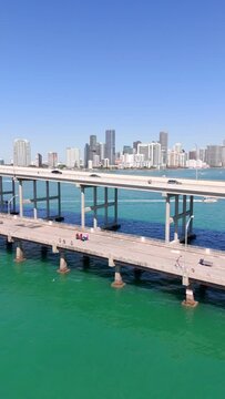 Vertical drone stock video Rickenbacker Causeway Miami Brickell Bay 2024