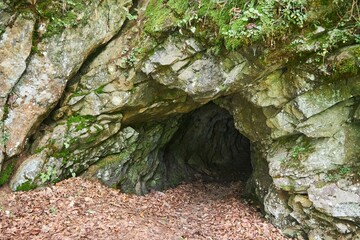 An old abandoned uranium ore mine. Industrial developments. Rock caves