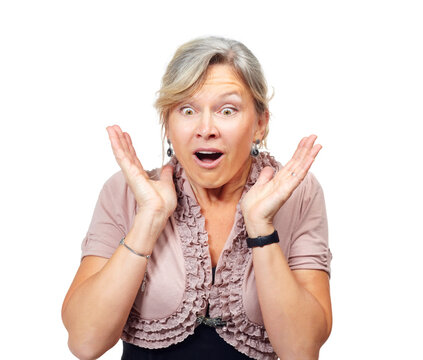 Mature woman, shock and studio with hands, thinking and surprise for announcement by white background. Senior person, wow and confused for news, information and notification with drama in Germany