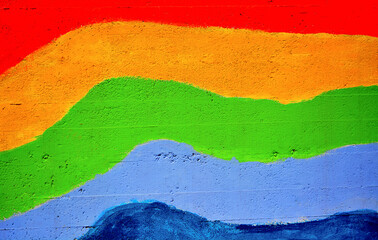 all the colors of the rainbow on the wall to remind you of happiness