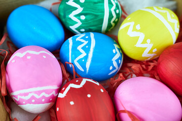 Fototapeta na wymiar Multicolored Easter eggs, close-up. Happy Easter concept.