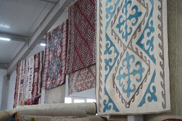 Traditional national Kazakh ornament on a felt carpet.