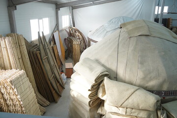 Wood and fabric. The basis for assembling a yurt is a traditional Kazakh house, the dwelling of nomads.