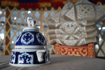 Decorative tableware with national Kazakh ornament. The decoration of the yurt.
