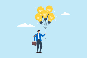 Businessman holds bright lightbulb idea balloons, illustrating innovation, creativity, and smart thinking. Concept of finding solutions, inspiration, imagination and wisdom to create new ideas