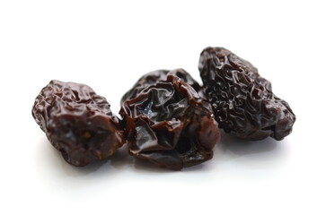 Raisins on a white background - stock photo
