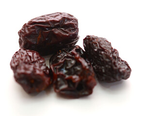 Raisins on a white background - stock photo
