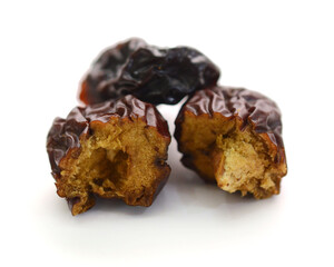 Raisins on a white background - stock photo

