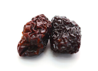 Raisins on a white background - stock photo
