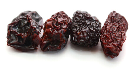 Raisins on a white background - stock photo

