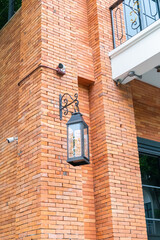 Lantern of brick house,lamp on wall Modern loft style,outdoor lighting lamp downlight wall for night.