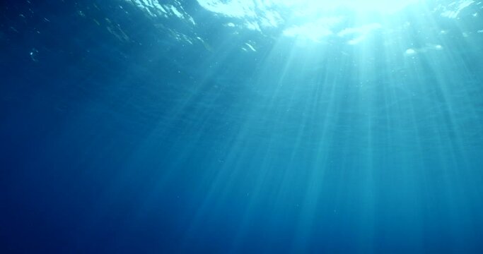 sun ray and sun beam scenery underwater waves on surface of water slow ocean scenery for background