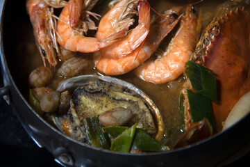 Seafood stew on the pot
