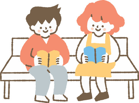 ベンチで本を読んでいる男の子と女の子_色