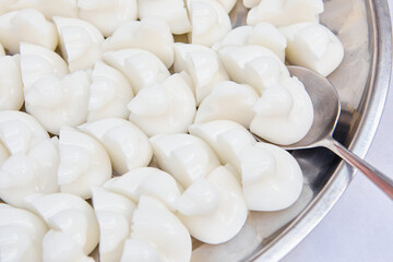 Full frame shot of white coconut jelly in the bowl