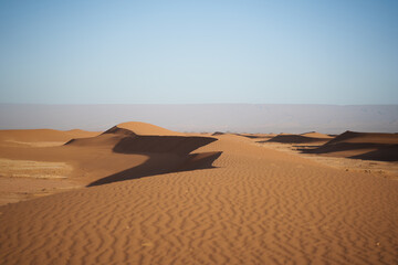 Sand Dune in the desert under blue sky