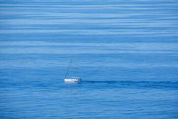 Obraz premium pleasure boat sailing through the bay of Palma, Mallorca, Balearic Islands, Spain