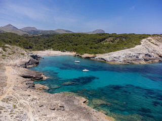 Fototapeta na wymiar pleasure boats at anchor , protected natural area, capdepera, Mallorca, Balearic Islands, Spain