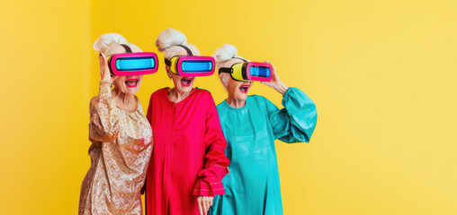 banner three old happy women 75 years old in VR glasses surprised on a yellow plain background with space for text. concept vr glasses, vision, broadcast, virtual reality