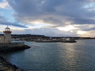 Lighthouse in small port on Howth in Ireland