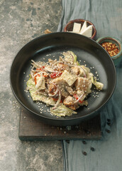 mixed salad with chicken and cheese top view