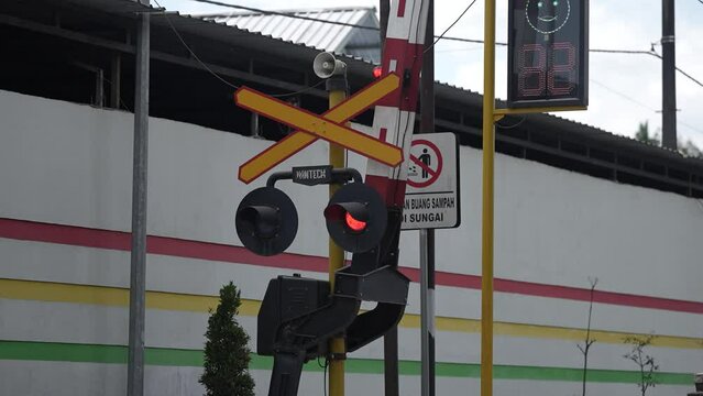 Close-up view of railroad crossing. railway crossbar manufacturing factory. railway safety services factory