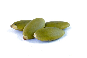 Closeup of green pumpkin seeds concept background