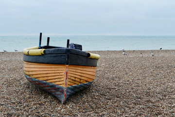 Moored boat at the beach in Brighton, UK