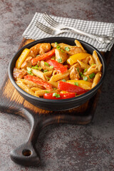 Rasta pasta is creamy pasta tossed with Caribbean style jerk chicken and sauteed bell peppers...