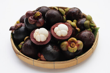 Fresh mangosteen fruit on white background.