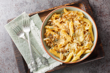 Delicious French onion pasta penne with caramelized onions, fragrant thyme, garlic and gruyere...