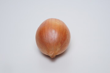 Ripe onions on a white background with room lighting
