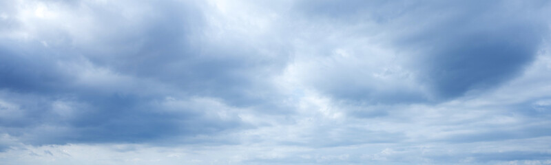 Web banner 4x1. Gloomy sky over the sea with cloud breaks