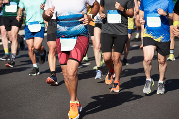 Fototapeta na wymiar Runners on the street. Healthy lifestyle. Marathon. Athletics