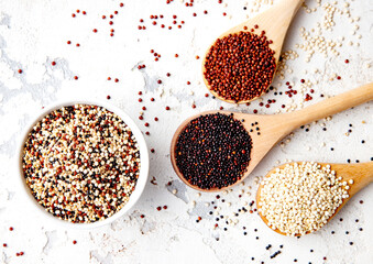 Set of Different types of Organic Quinoa. White, Black, Red, and Tri-Color (Rainbow) Quinoa. Healthy Eating Concept. Top View. 