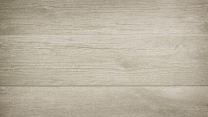 Smooth wooden board background mixed with a small grain effect. With a pale gray-brown light...