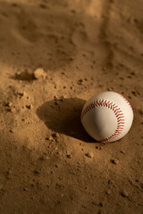 Baseball ball on the sand. Close up